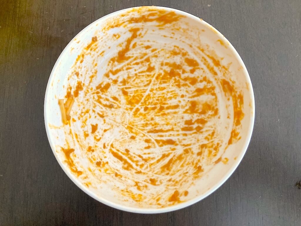 モグモの「まろやかな旨みのトマトとナスのミートソース」を完食した皿